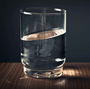 clear drinking glass filled with water